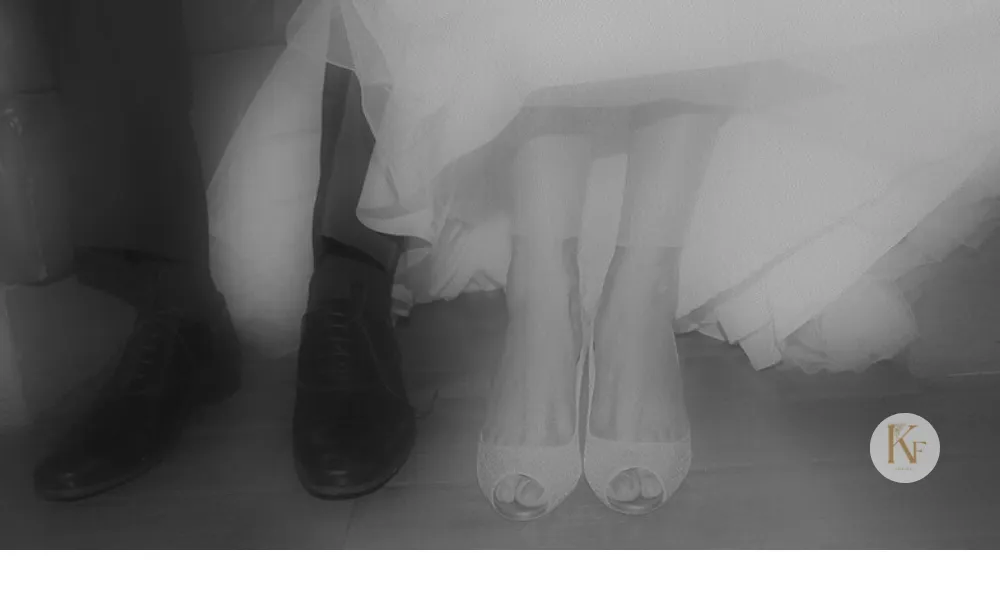 Photograph of shoes of bride and groom shot by The Knot in Frames at a Christian wedding in Bengaluru
